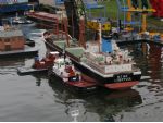 Just one of the large tows being skilfully navigated through the labyrinth of docks.